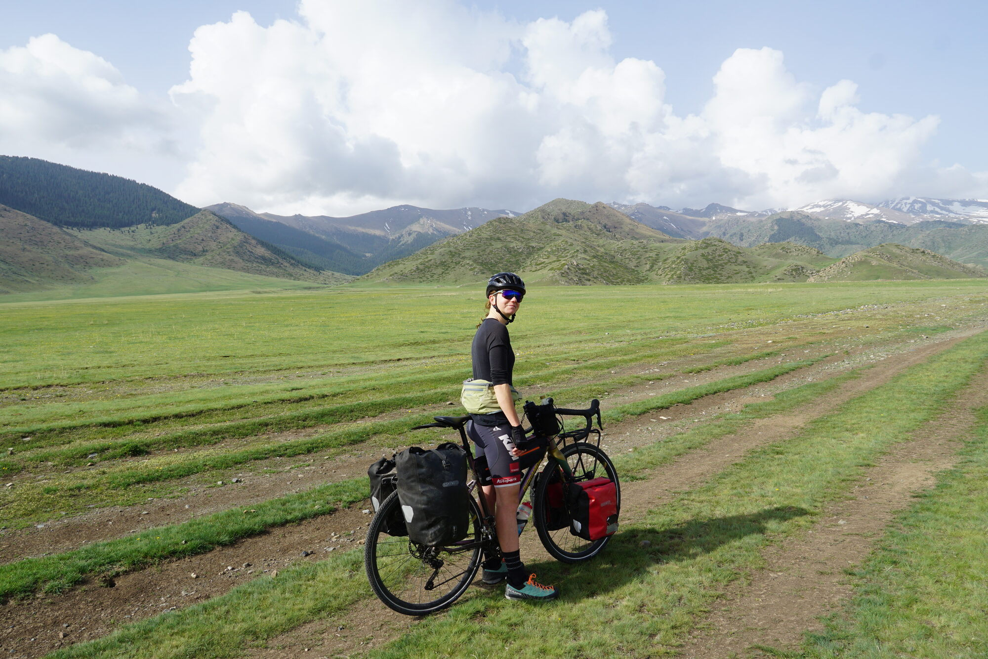 Cyclist on a Kazakh plateau